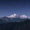 Beautiful view of Meili Xue Shan Shengpingzhen mountain range under a blue sky in China