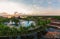 Beautiful view of Memories Caribe resort grounds, buildings and tropical garden on early morning sunrise time