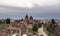 Beautiful view of a monastery and the city of Targoviste, Romania seen from atop of the Chindia Tower