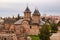 Beautiful view of a monastery and the city of Targoviste, Romania seen from atop of the Chindia Tower