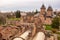 Beautiful view of a monastery and the city of Targoviste, Romania seen from atop of the Chindia Tower