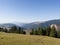 Beautiful view of Mount Vlasic in Babanovac during sunny day with haze in distance in autumn