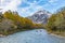 beautiful view of mountain with snow and fog with blue river and