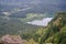 Beautiful view from mountain top on hikers on the rock