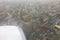 Beautiful view of the Mumbai Bombay city and cloudy weather from airplane window.