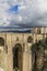 Beautiful view of the New Bridge Puente Nuevo in Ronda with mountains in the background