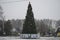 The beautiful view of the New Year tree on the square near the kinder park.