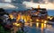 Beautiful view in the night at touristic village on the hill with colorful mediterranean buildings. Fantastic travel and