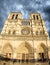 Beautiful view of Notre Dame Cathedral in Paris on a clody spring day.