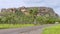 Beautiful view of Nourlangie Rock or Burrunggui in Kakadu Park on a sunny day with some clouds, Australia