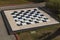 Beautiful view of outdoor place with  large street checkers on the grass. Outdoors activities concept. Intellectual game.