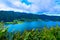 Beautiful view over Lagoa Azul and surrounding lush mountains.