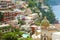 Beautiful view of Positano village with colorful houses and dome of the church, Amalfi Coast, Italy