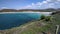 Beautiful view of Praia das Conchas, with a beautiful blue sea and sky with clouds.