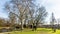 Beautiful view of the Proosdij park with its pond, a dirt path and its leafless trees