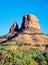 Beautiful view of red rock mountains with juniper trees at the foot in the Northern Arizona deserts