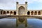 A beautiful view of the reflection of the architectural decorations of an ancient Iranian building on the water. Shiraz, Iran