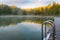 Beautiful view of a reflective bathing pond in a forest during sunset