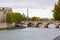 Beautiful view of the river Saine with the Eiffel tower on the left in Paris, France