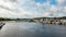 Beautiful view of the river Shannon with boats anchored on the coast and picturesque houses