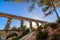 Beautiful view of roman Aqueduct Pont del Diable in Tarragona at sunset