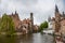Beautiful view of the Rozenhoedkaai canal in Bruges with the belfry in the background
