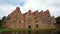 Beautiful view of Salzspeicher brick warehouses in old town, beautiful architecture, sunny day, Lubeck, Germany