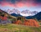 Beautiful view of Santa Maddalena village in front of the Geisler or Odle Dolomites Group. Colorful autumn sunset in Dolomite Alps