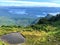 A beautiful view of the scenic ocean and forested mountains from on the top of mount raymond