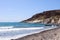 Beautiful view of the sea and mountains. Greek island of Santorini on a warm sunny day. Travel to the picturesque places of Europe