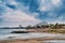 Beautiful view of the sea and a populated beach in Villeneuve-Loubet, France, on a cloudy day