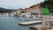 Beautiful view from the ship on motorboats standing in the sea and magnificent views of the old town of Hvar. Hvar