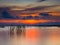 A beautiful view of the sky and reflecions on the water surface.after sunset Songkhla lake area,Thailand