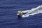 A beautiful view of a small Atoll in the middle of the south Pacific Ocean from the cruise ship deck while the officers and the