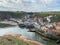 Beautiful view of small houses and river in Staithes 
Village, England