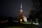 Beautiful view of small lovely local church in late evening with iluminated lights