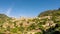 Beautiful view of the small town Valldemossa situated in picturesque mountains on Mallorca, Spain.