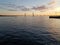 Beautiful view of the sunset. Cable-stayed bridge over the Gulf of Finland. Wonderful orange-blue sky with clouds