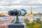 Beautiful view to spires of Admiralty and Peter-Pavel`s Fortress from Isaac cathedral in Binoculars, Saint Petersburg, Russia.