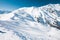 Beautiful view to winter Swiss Alps and ski-lifts