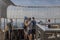 Beautiful view of tourists on open main observation desk of Empire State Building. New York.