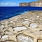 Beautiful view of traditional salt pans, Xlendi, Gozo, Malta