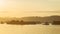 Beautiful view of traffic of tugboats pulling barge of coal at Mahakam River, Samarinda, Indonesia at dawn.