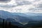 Beautiful view of tree-covered mountains from the hilltop