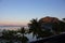 Beautiful view of tropical morning bay from balcony. Morning on Philippines island with trees and boats. Sunrise on Palawan.