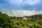 Beautiful view of the Tuscany fields from the top of the hill at Boboli Garden. Rainy cloudy clouds over the beautiful Tuscan