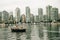 Beautiful view of Vancouver skyline with ships lying in harbor at False Creek, British Columbia, Canada - sep, 2019