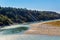 A beautiful view with water, pebbles and hills in Manas National Park, Assam, India