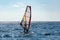 Beautiful view of windsurfer sailing on the waves. Windsurfing on the Black Sea. Yalta, Crimea