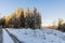 Beautiful view of winter scape. Country road in snow forest.